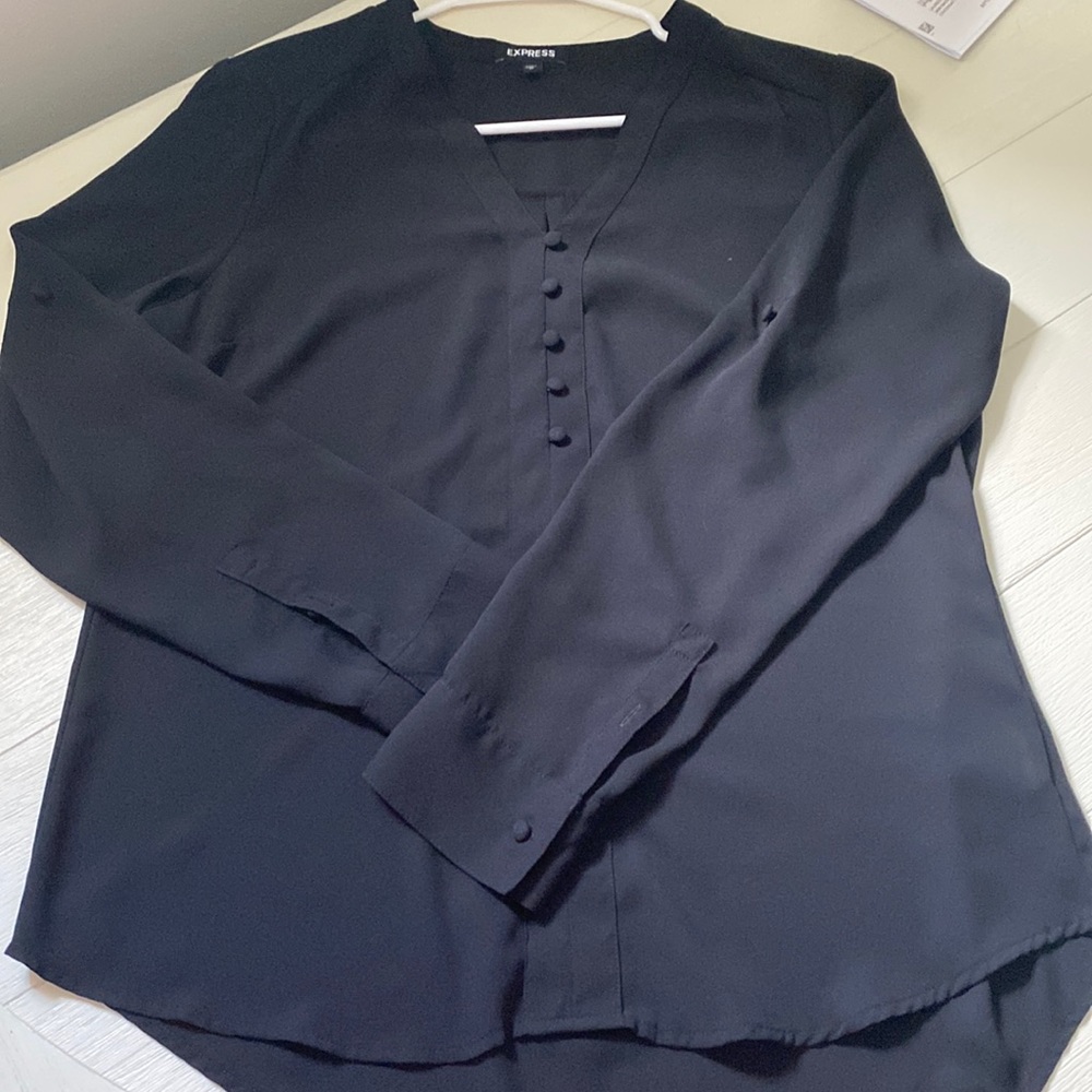 Express black top in size medium. Long sleeved that can be buttoned up